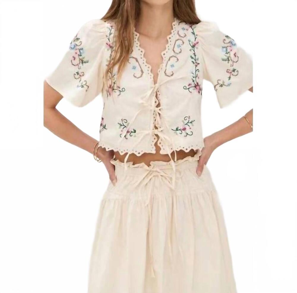 NEW MOON RIVER short puff sleeve eyelet top with tie in cream